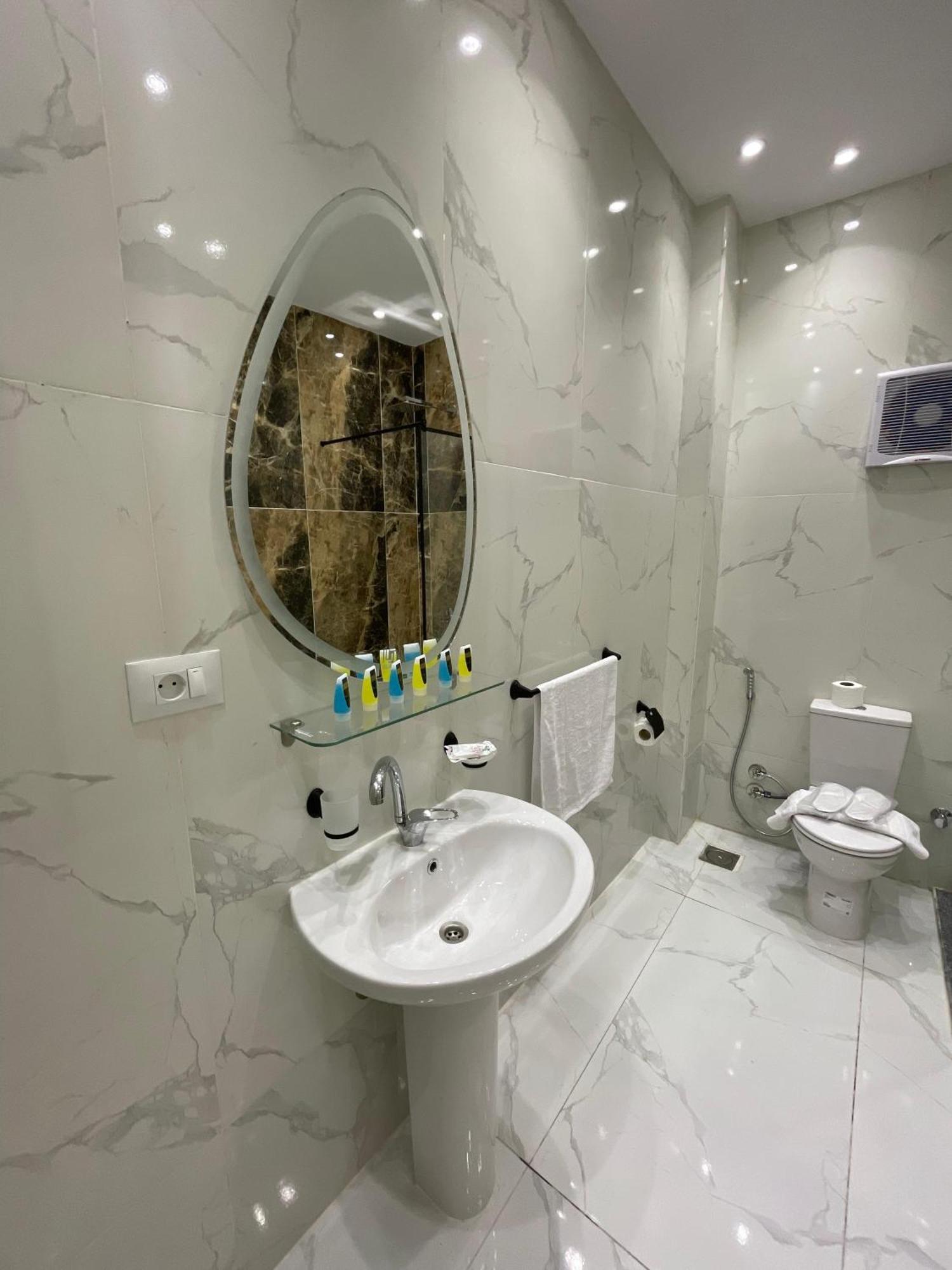 New Glamour Pyramids Hotel Kafret el-Gabal Extérieur photo