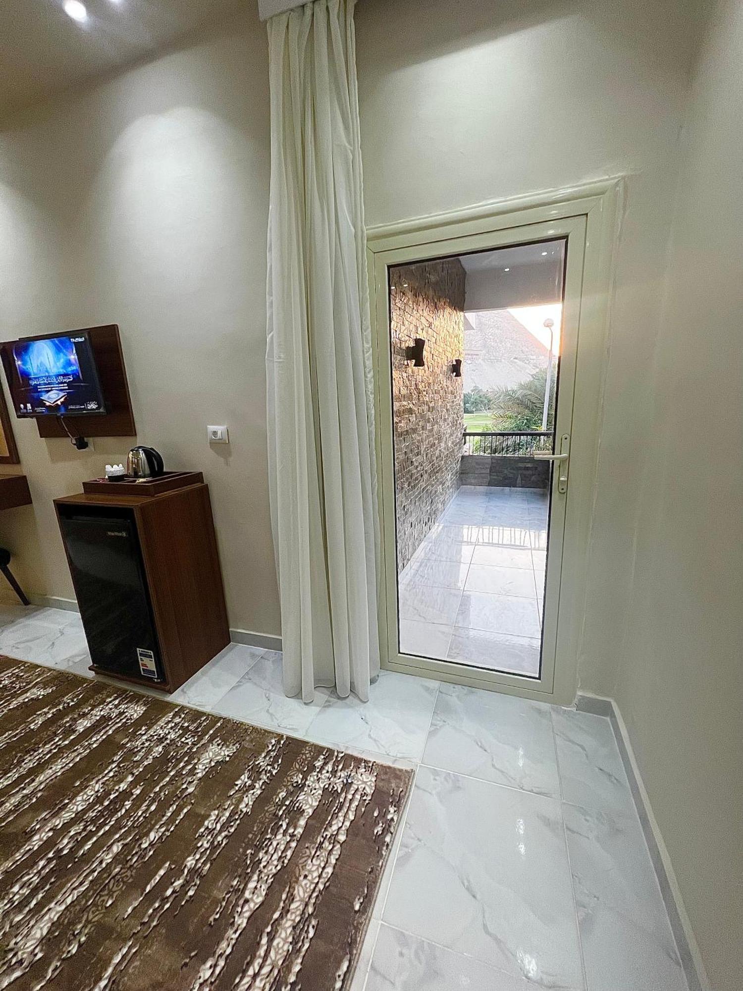 New Glamour Pyramids Hotel Kafret el-Gabal Extérieur photo